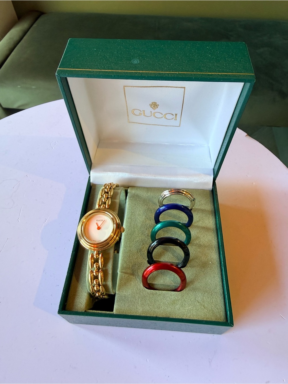 Gucci Gold Tone Interchangeable Bezel Watch